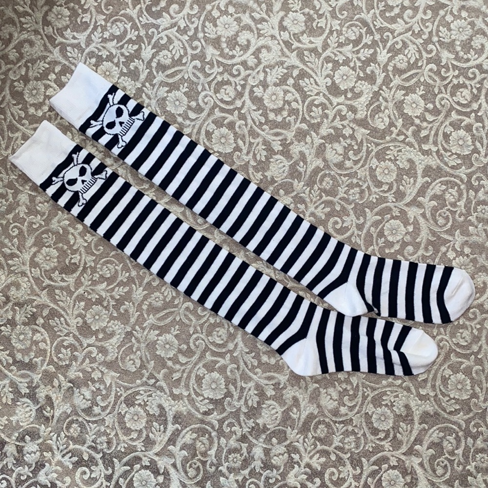 Thigh high striped skull socks